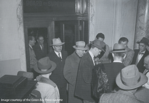 1949-11-30-Lambeau leaving Board meeting at courthouse